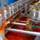 canned-fish-factory-food-industry-sardines-in-red-tomato-sauce-in-tinned-cans-at-food-factory-food